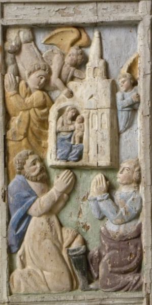 Maria van Loreto/Tweede overbrenging, nu naar Italië. 18e eeuw, houtreliëf. Frankrijk, Bretagne, St-Ségael, Chapelle St-Sébastien.
